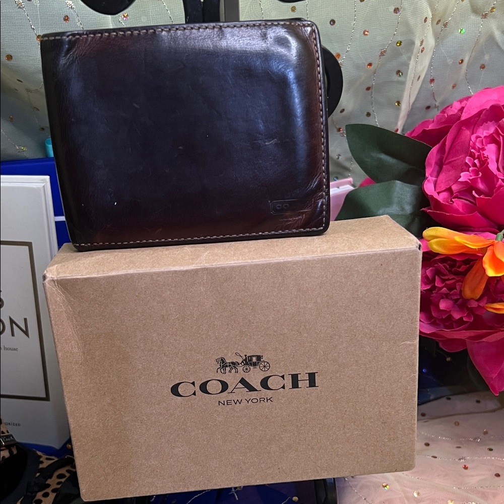Coach double billfold wallet crafted from richly grained water buffalo leather